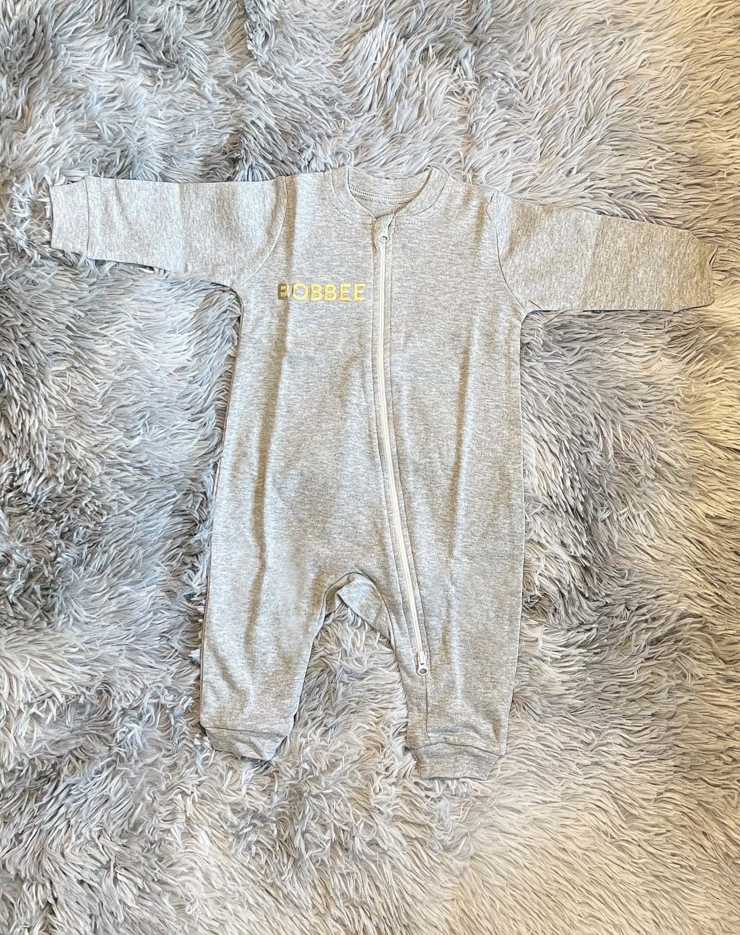 Luxurious Babywear: Grey Romper with Gold Embellishments