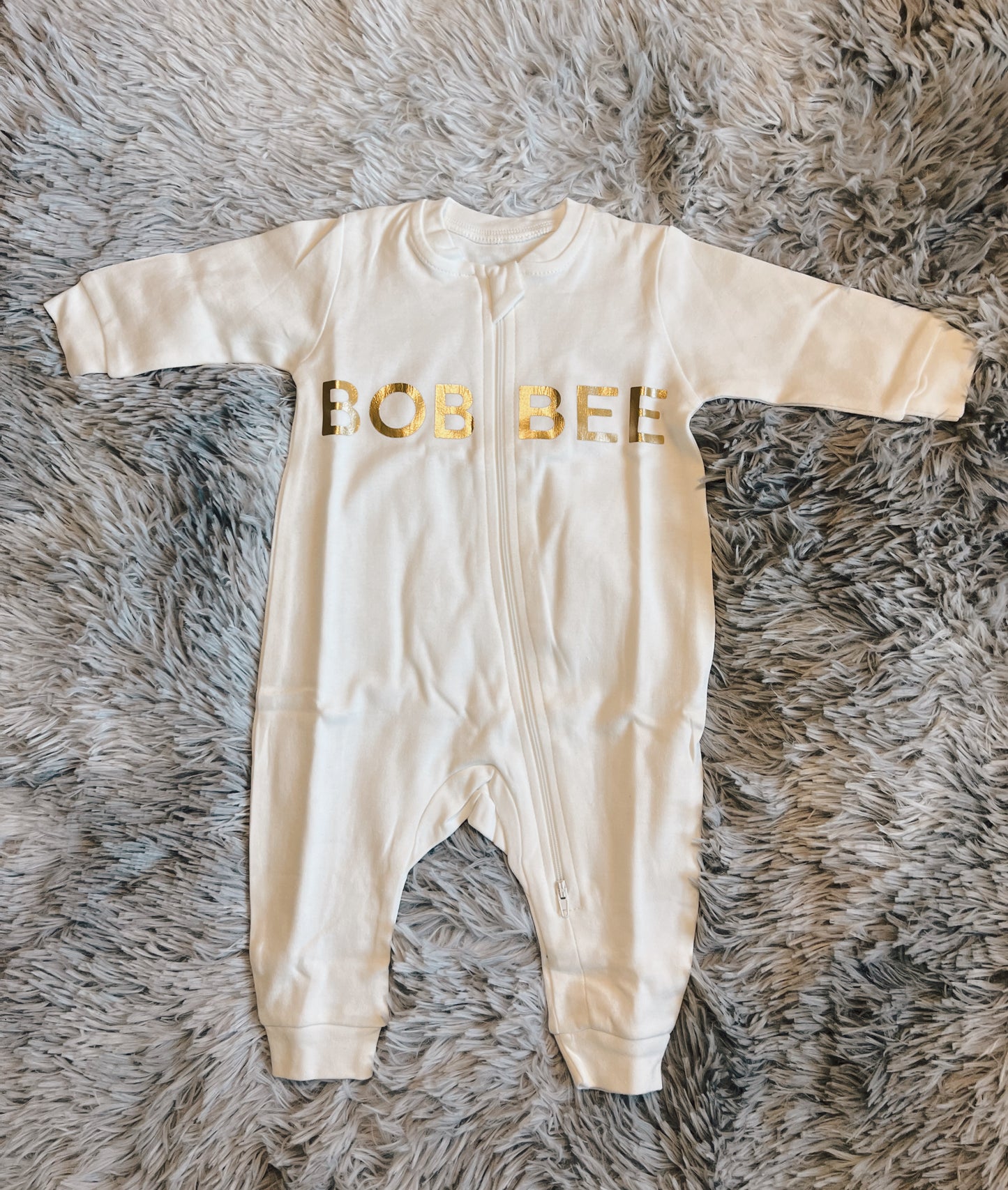 Timeless Elegance: White Baby Romper with Gold Details